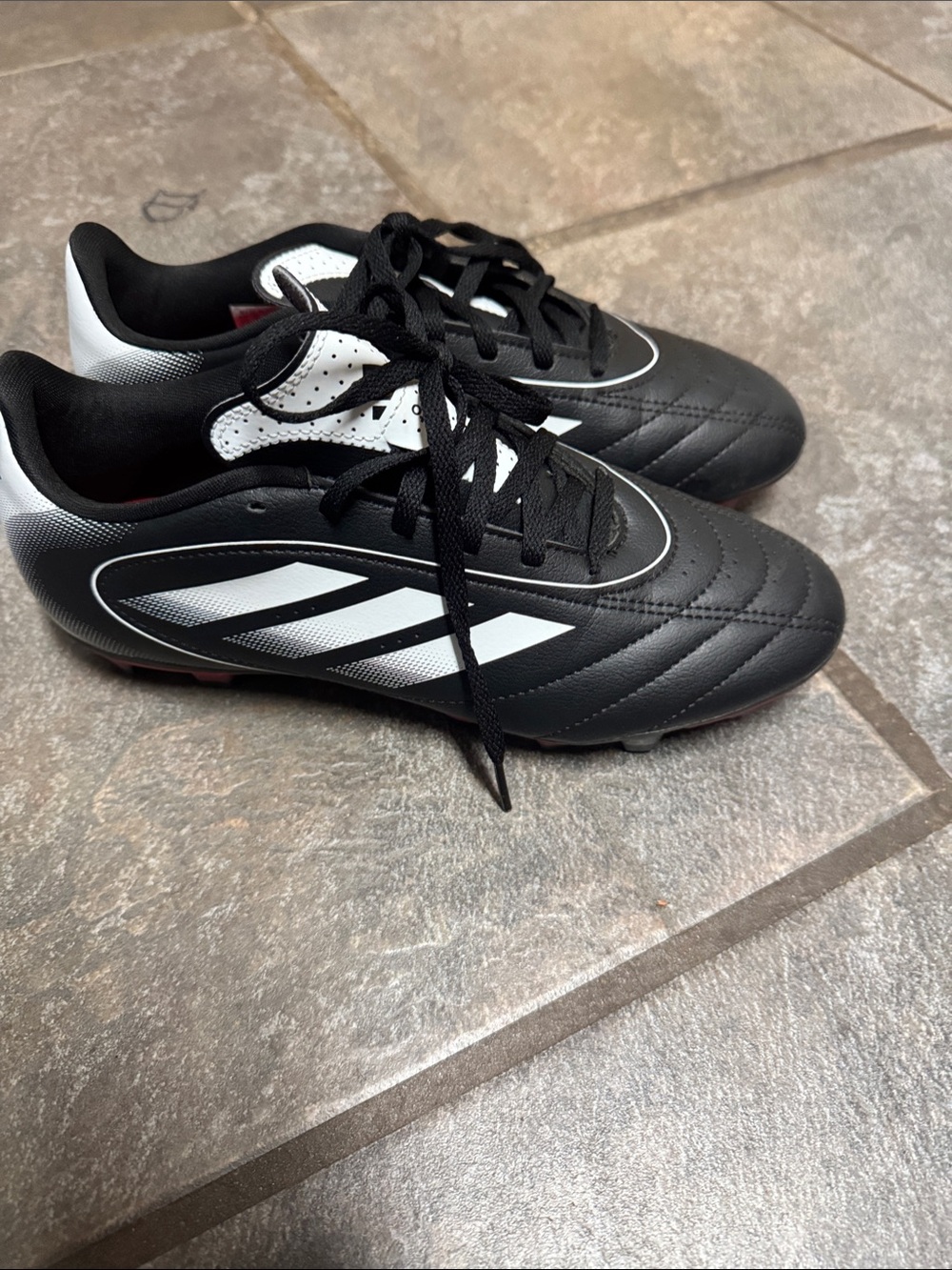 Classic Black and White Adidas Soccer Cleats